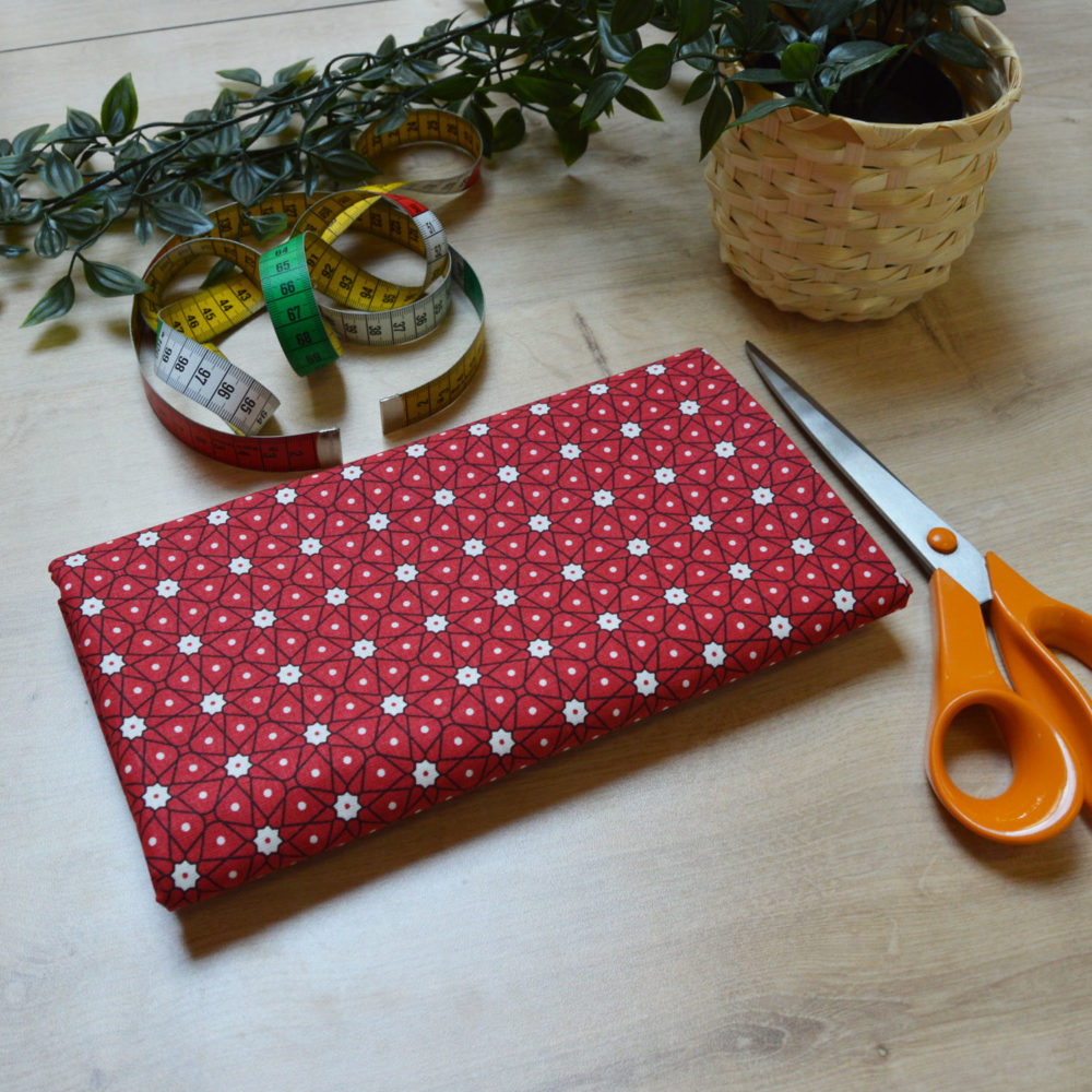 Tissu coton imprimé star rouge